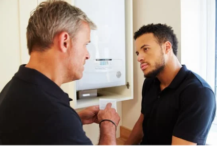 man doing consulting with boiler expert